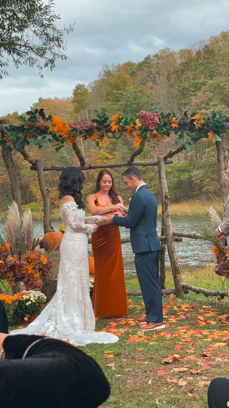 Vows exchanged at the riverside arbor